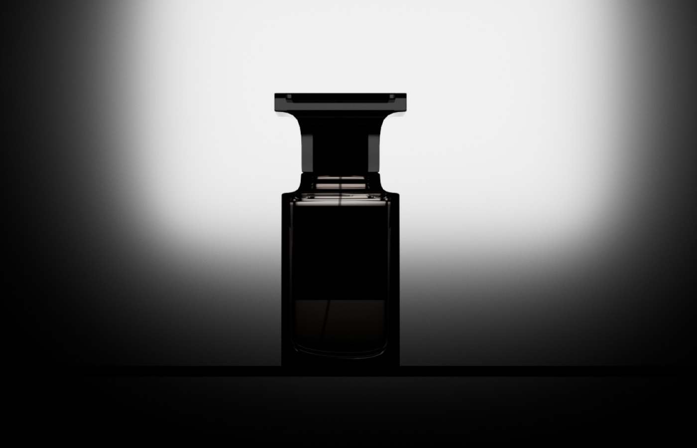 Silhouette of the Oud Wood bottle against a soft white light